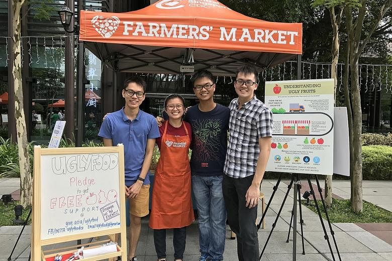 UglyFood co-founders (from left) Lee Zhong Han, 21; Yeo Pei Shan, 23; Foo Lin Geng, 23; and Augustine Tan, 23, at Zhongshan Park on Aug 26 last year.