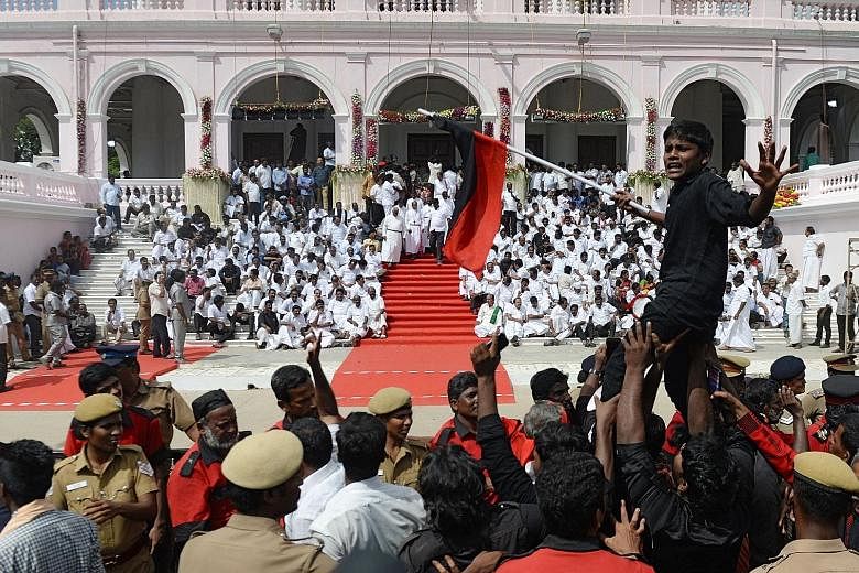 Dravida Munnetra Kazhagam supporters yesterday at Rajaji Hall in Chennai, where Mr Muthuvel Karunanidhi's body lay.