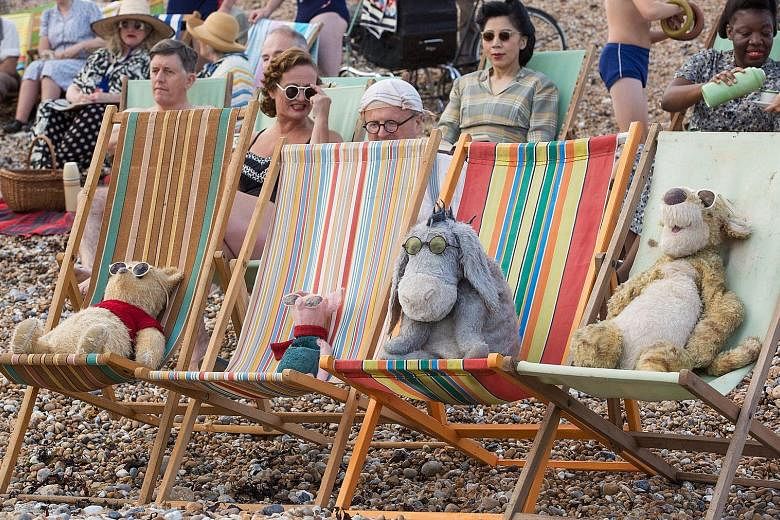 (From far left) Winnie the Pooh, Piglet, Eeyore and Tigger in the film Christopher Robin.