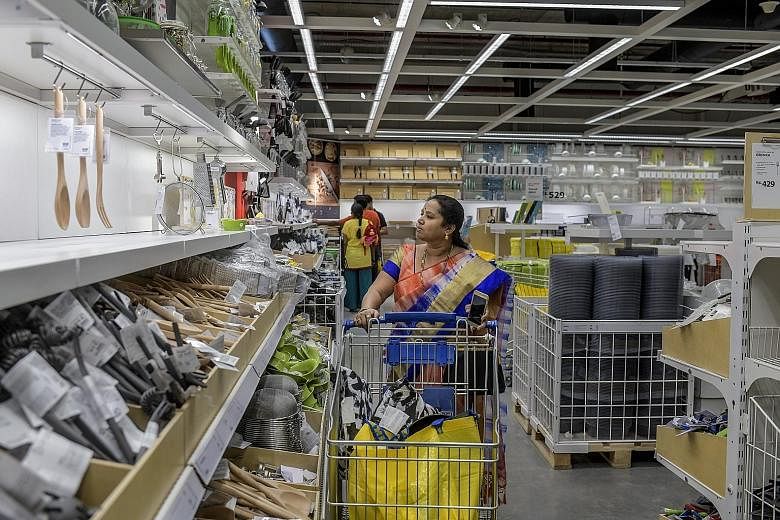 A woman browses the kitchenware shelves at Ikea's new store in Hyderabad, the Swedish retail giant's first location in India. Ikea is counting on new customers in industrialising nations bolstering sales growth in the face of brand fatigue and increa