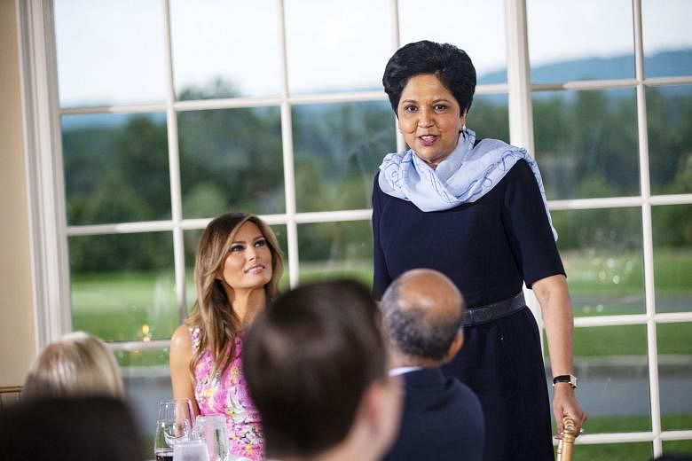 PepsiCo CEO Indra Nooyi with US First Lady Melania Trump at a dinner with business leaders hosted by President Donald Trump this month. Ms Nooyi announced on Monday she will leave the post in October. That will leave just 23 female CEOs leading Fortu
