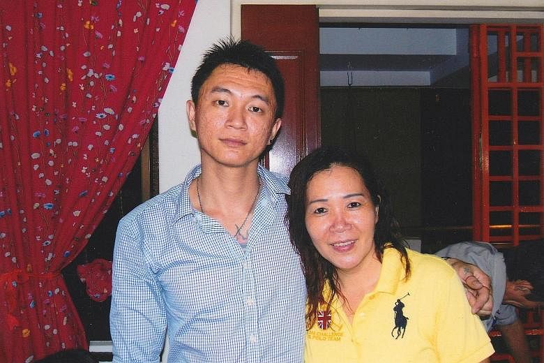 Mr Kim with his mother Foo Sai Fang in 2008. Though his parents divorced when he was 11, his mum did not fight for the flat so her kids would have a permanent roof over their heads. But that was not to be. Mr Kim Whye Kee, 39, in his pottery studio. 