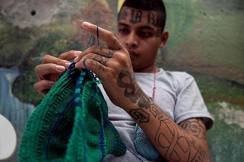 War on gangs (from left): A former gang member in a prison in El Salvador on July 16; a makeshift memorial seen on May 22 in New York, where four young men were allegedly killed by MS-13 gang members last year; Trump supporters backing the crackdown 