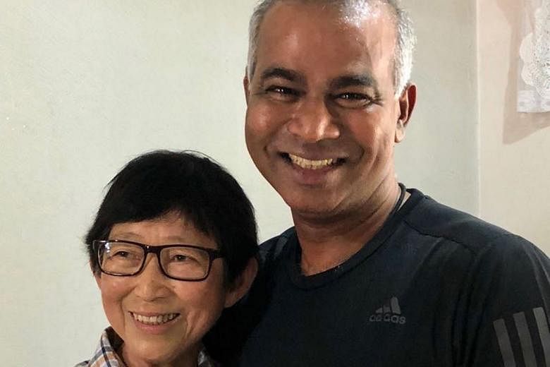 Mr Veera Sekaran with his former teacher, Mrs Chee Siew Chuan. Her kind act of putting together a stationery set and a school bag for him when he was in Canberra Primary was featured in a film at the National Day Parade. Her daughter reached out to h