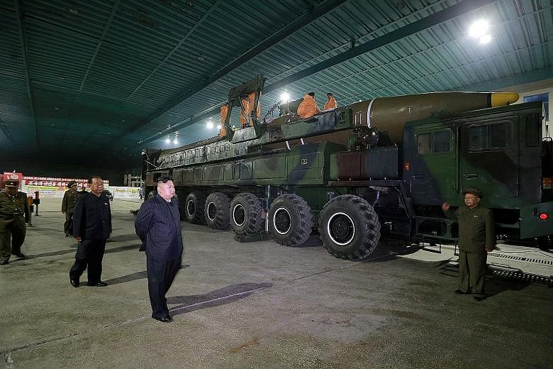 North Korean leader Kim Jong Un inspecting the intercontinental ballistic missile Hwasong-14 in July last year. Concern about US missile defences has grown with the escalating threat from North Korea. Last year, North Korea conducted about a dozen mi