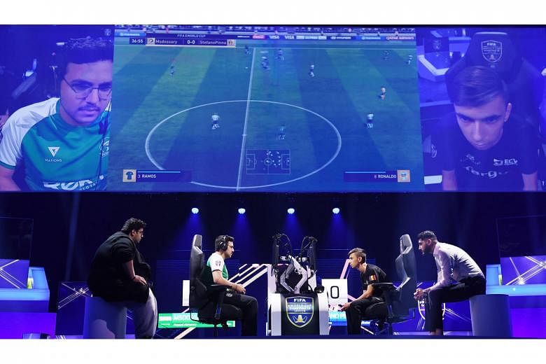 Saudi Arabia's Mosaad "MSDossary" Aldossary (in green), the eventual champion, taking on Belgium's Stefano "Pinna" Pinna in the Fifa eWorld Cup 2018 grand final earlier this month.
