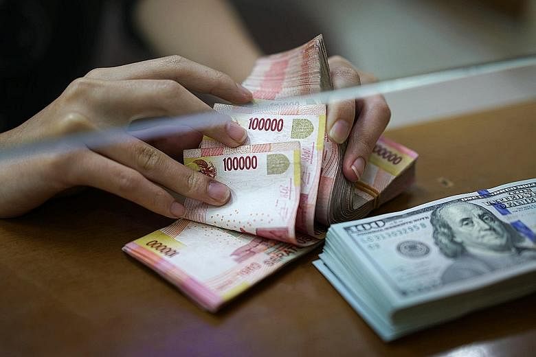 The rupiah fell another 0.2 per cent against the US dollar yesterday. Turkey's financial crisis has sparked fears of market contagion.