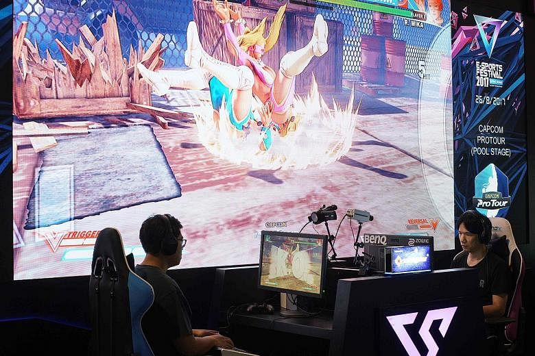 Participants in the fighting video game Street Fighter V at the Hong Kong Esports festival last year.