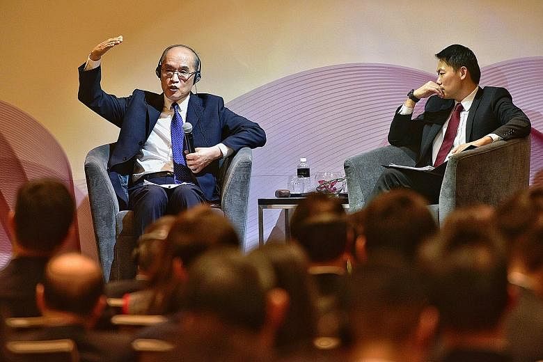 China's Prosecutor-General Zhang Jun at the dialogue yesterday with the moderator, Solicitor-General and Senior Counsel Kwek Mean Luck. Mr Zhang says the difference between China's brand of rule of law and Western models is its one-party governance.