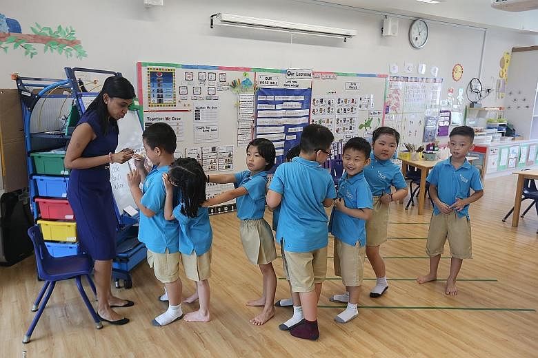 MOE kindergartens such as this in Punggol raise the quality of early childhood practices and offer affordable pre-school education.