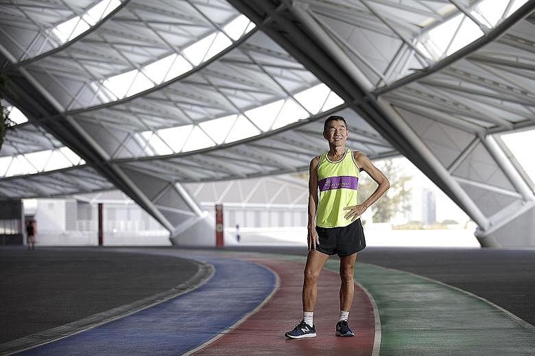 Mr Koh Kwee Boon, 64, was diagnosed with retinitis pigmentosa, a condition that causes a gradual loss of vision, when he was 40. Four years ago, he had to give up running completely. Born with clear vision, he had run full marathons in his youth. In 