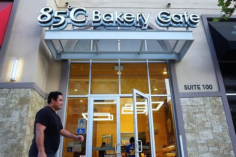 A branch of the Taiwan bakery chain 85C in Los Angeles. On her trip to the United States, President Tsai Ing-wen was given a cup of coffee and a goodie bag, and posed for pictures with cafe staff during a visit to an 85C cafe. This sparked an outcry 