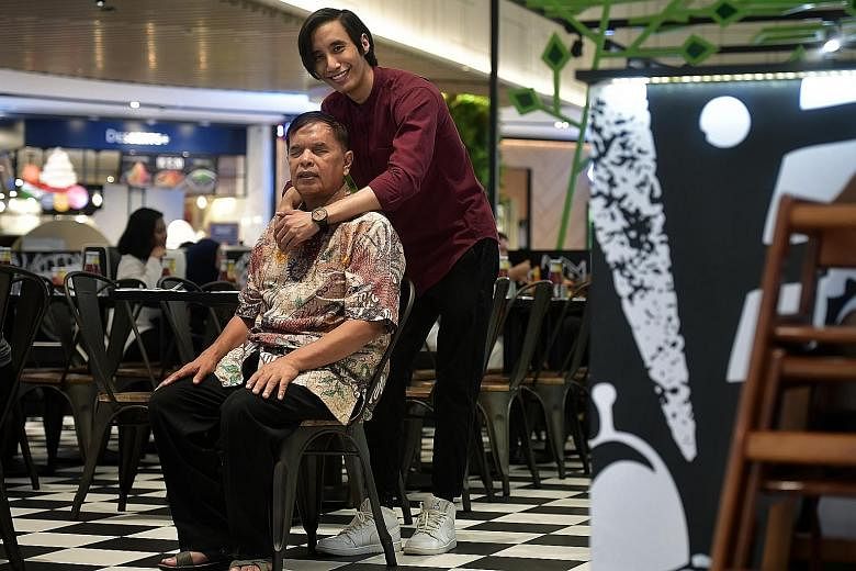 Mr Mashruddin Saharuddin and his youngest son Nizaruddin, who started following the older man on his busking rounds when he was 13. On Aug 9, at the National Day Parade show, their story was featured as part of a filmlet on inspirational Singaporeans