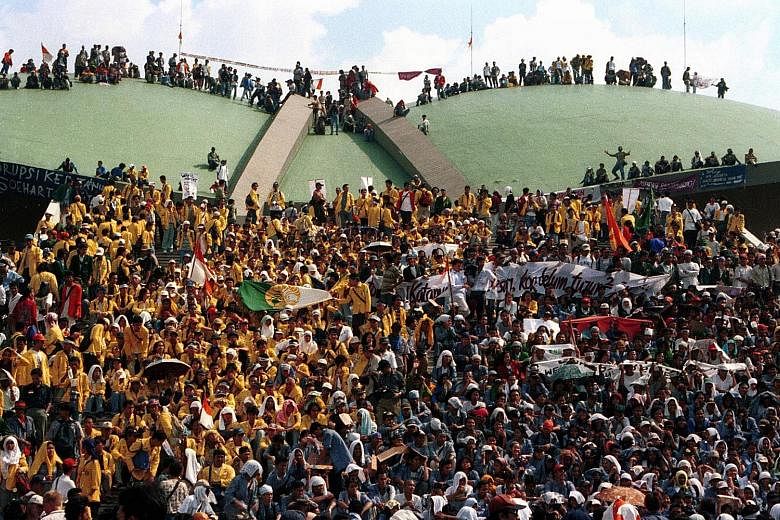 Thousands of students and activists staging a protest on Parliament's grounds in May 1998 to demand the resignation of Indonesian leader Suharto. Protesters, lawmakers and the military were eventually united in removing the strongman of 32 years from