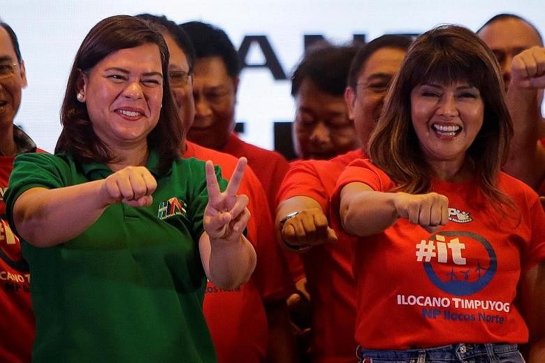 Ms Sara Duterte (in green) forms an alliance with Ms Imee Marcos. In photos last week, they are seen making Mr Duterte's trademark fist and the V sign associated with the late Ferdinand Marcos' rule.