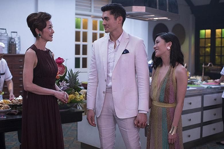 Crazy Rich Asians features (from far left) Michelle Yeoh, Henry Golding and Constance Wu.