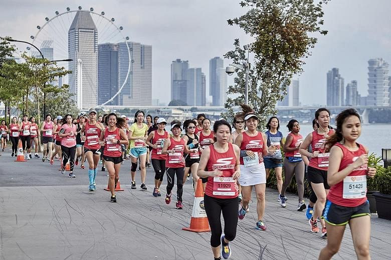 More than 7,000 runners took part in the Shape Run - Singapore's original all-women race - yesterday at Gardens By The Bay East. There were four categories - the 5km and 10km Women's Open, the 3x5km Squad Relay and a fun 1.8km Family Run. Participant