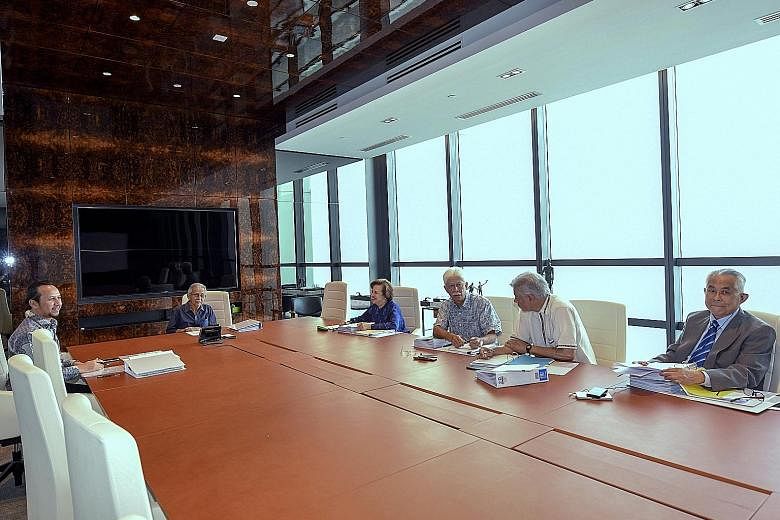 Tun Daim Zainuddin (second from left) chairing a meeting of the CEP on Friday, with council members (from right) Jomo Kwame Sundaram, Hassan Marican and Zeti Akhtar Aziz, and council secretariat and economist Muhammad Abdul Khalid (far left).