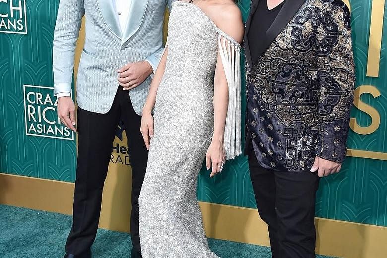 Author Kevin Kwan (far right), with actors Henry Golding and Constance Wu, at the premiere of Crazy Rich Asians in Hollywood, California, on Aug 7.