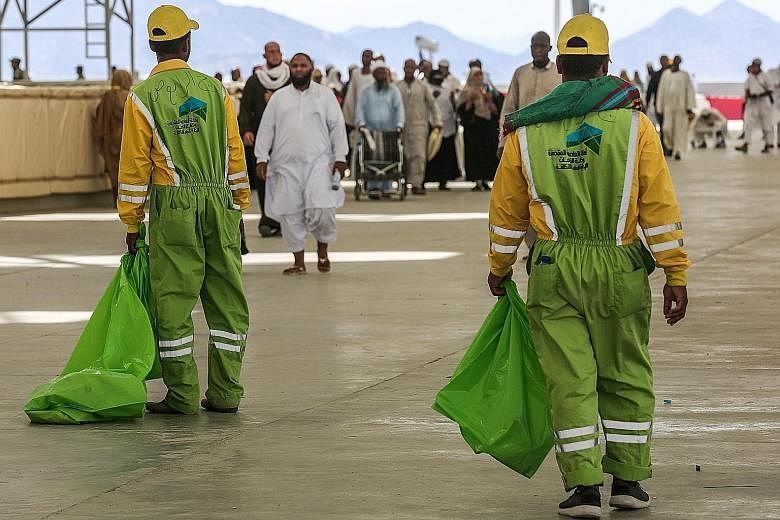 Workers cleaning up as the annual Muslim pilgrimage season in Saudi Arabia winds down.