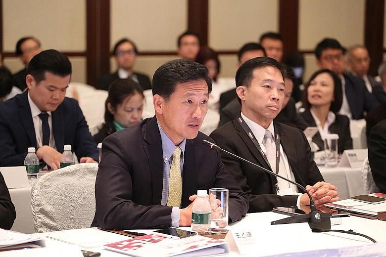 Education Minister Ong Ye Kung (left) with Enterprise Singapore chief executive Png Cheong Boon at the Singapore-Guangdong Collaboration Council meeting yesterday that was attended by over 200 representatives from Singapore and Guangdong.