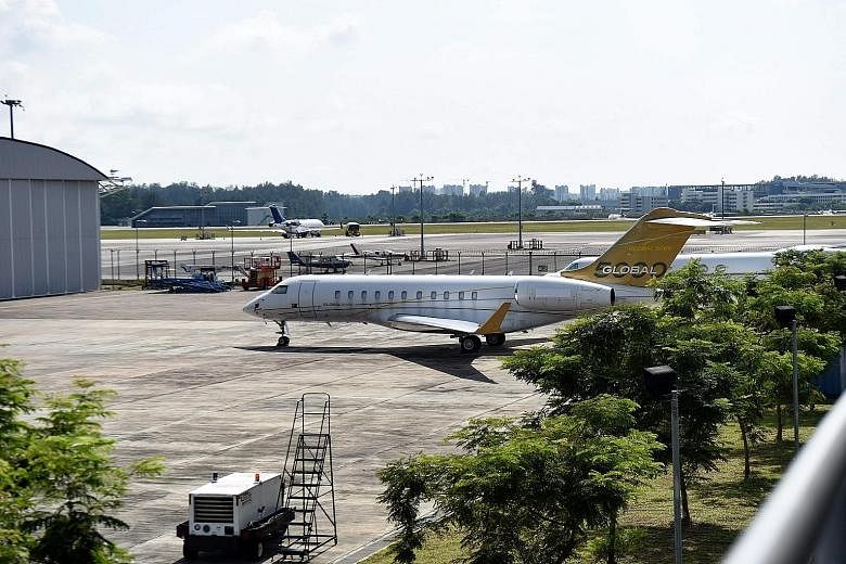 The US$35 million (S$48 million) Bombardier Global 5000 plane on the tarmac of Seletar Airport. Fugitive businessman Low Taek Jho allegedly bought it with funds stolen from 1MDB.