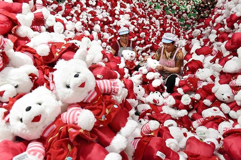 Chinese workers making stuffed toys for export. Asean countries, particularly Vietnam, Cambodia and Malaysia, will be among the biggest winners in the global supply chains in the event of a prolonged US-China trade war.