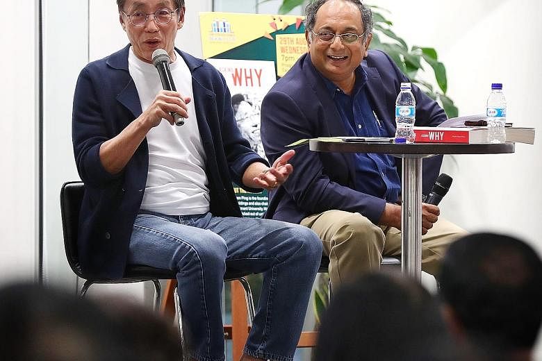 Prominent entrepreneur Ho Kwon Ping discussing his new book Asking Why at the sixth edition of The Straits Times Book Club, moderated by ST associate editor Ravi Velloor, at the National Library headquarters' programme zone yesterday.
