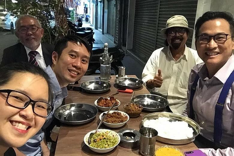 (Clockwise from far left) Singapore activists Kirsten Han and Jolovan Wham, Tan Wah Piow, Mr Hishamuddin Rais and academic Thum Ping Tjin having dinner in Kuala Lumpur yesterday.