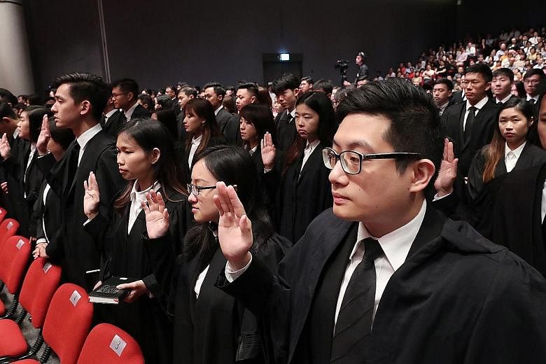 Lawyers gathered at the Supreme Court auditorium for yesterday's mass call, a proceeding that formally admits them to the Bar. Currently, admission to the Bar is synonymous with being qualified to practise law, but the new regime proposes to uncouple