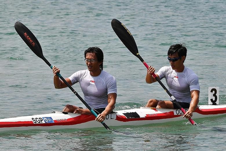Lucas Teo (left) and Brandon Ooi in the kayak doubles (K2) 1,000m men's final yesterday. Despite a false start due to a technical glitch, they focused on their game plan and finished just out of the medals in fourth.