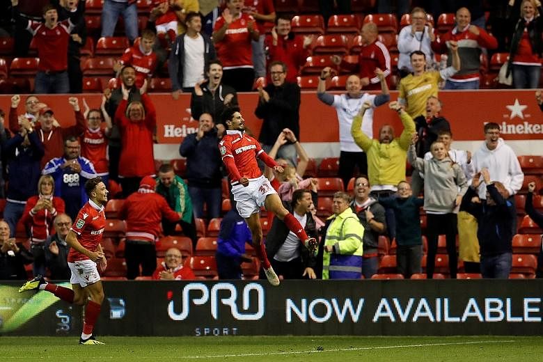 Gil Dias celebrating scoring Nottingham Forest's third goal to make it 3-1 against Newcastle in their League Cup second-round game.