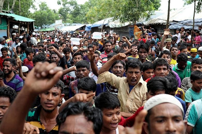 A Rohingya protest in the Kutupalong refugee camp to mark the one-year anniversary of their exodus to Bangladesh last Saturday. There has been an uptick in "chatter" promoting the crisis as a powerful motivation for militant action.