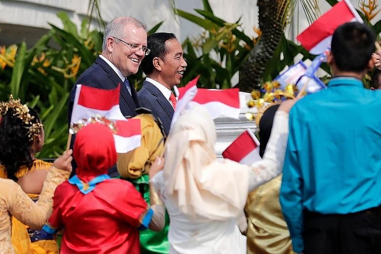 Australian Prime Minister Scott Morrison and Indonesian President Joko Widodo at the presidential palace in Bogor yesterday.