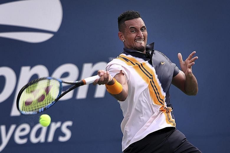 Australia's Nick Kyrgios in his US Open second-round match with France's Pierre-Hugues Herbert. Umpire Mohamed Lahyani stunned fans when he climbed down from his chair to give Kyrgios a controversial pep talk, which sparked a row over the impartialit