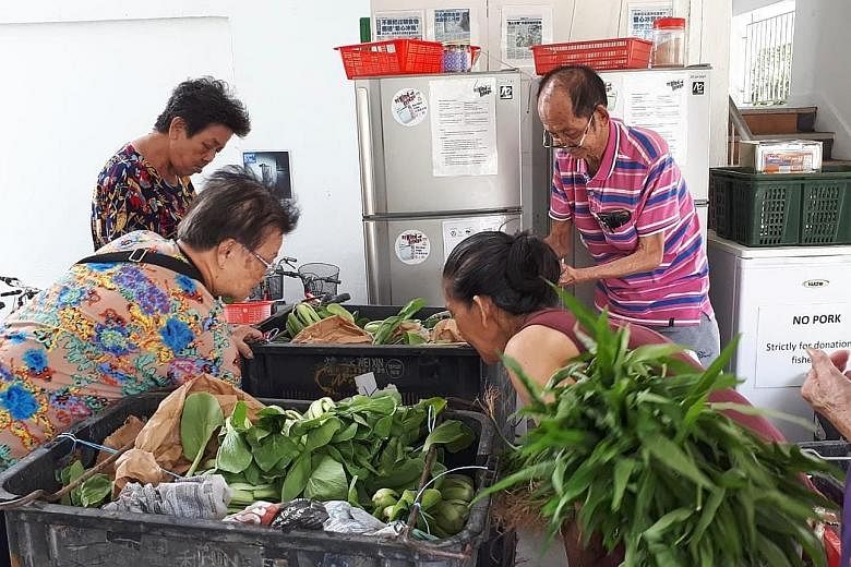 Under grassroots initiative My Kind Of Fridge, two full-sized refrigerators and one freezer stand at the void deck of Block 441 Tampines Avenue 10 for the public to donate fresh food for needy residents of Blocks 441 and 442.