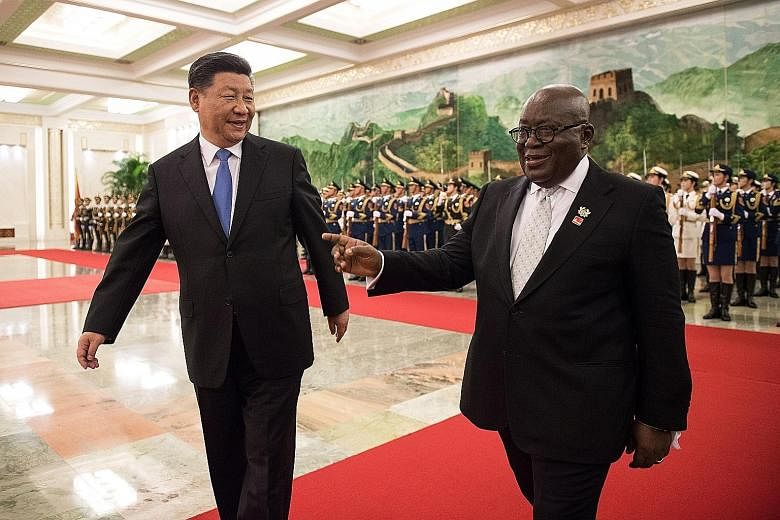 China's President Xi Jinping and Ghana's President Nana Akufo-Addo at the Great Hall of the People in Beijing, China yesterday.