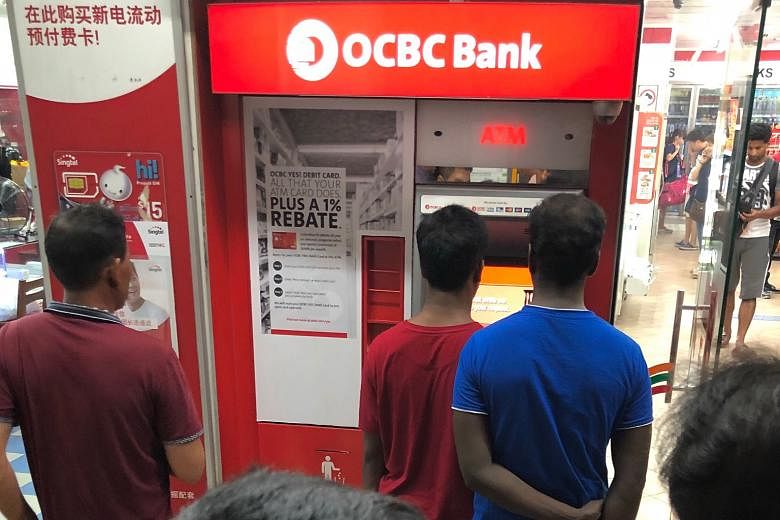 Queues started forming at this OCBC ATM in Lorong 4 Toa Payoh last night because of the service outage