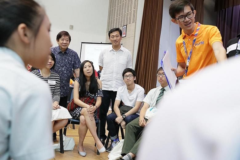 More than 200 young people from Sembawang GRC participated in a post-National Day Rally dialogue hosted by grassroots advisers yesterday. At the session were Minister for Transport Khaw Boon Wan (left) and Minister for Education Ong Ye Kung (centre).