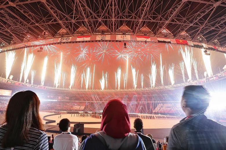 A dazzling display of fireworks during the closing ceremony of the 18th Asian Games in Jakarta yesterday.