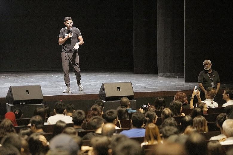 Travel video blogger Nuseir Yassin at the farewell meet-up with more than 750 fans at Mediacorp's MES Theatre yesterday. He will stay in Singapore for another three or four days.
