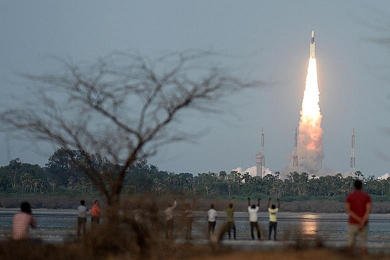 The launch of a communication satellite on the Geosynchronous Satellite Launch Vehicle Mark III at Sriharikota last year. In the manned mission, the astronauts are to spend five to seven days in orbit 400km in space.