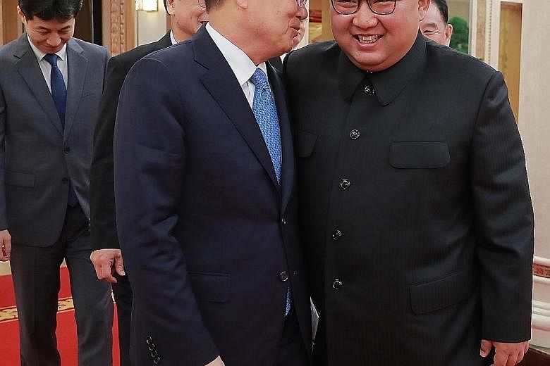 South Korean chief envoy Chung Eui-yong speaking to North Korean leader Kim Jong Un during their talks in Pyongyang on Wednesday.