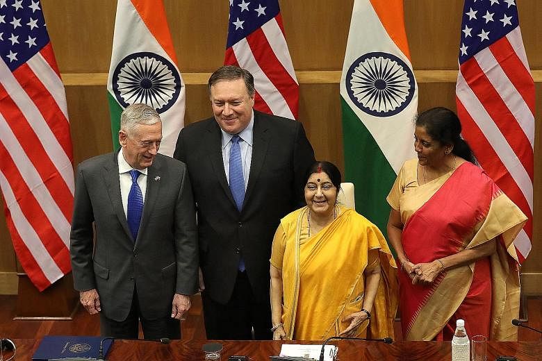 US Defence Secretary James Mattis (left) and Secretary of State Mike Pompeo posing for a photo with India's Defence Minister Nirmala Sitharaman (right) and External Affairs Minister Sushma Swaraj after their "two-plus-two" talks in New Delhi yesterda