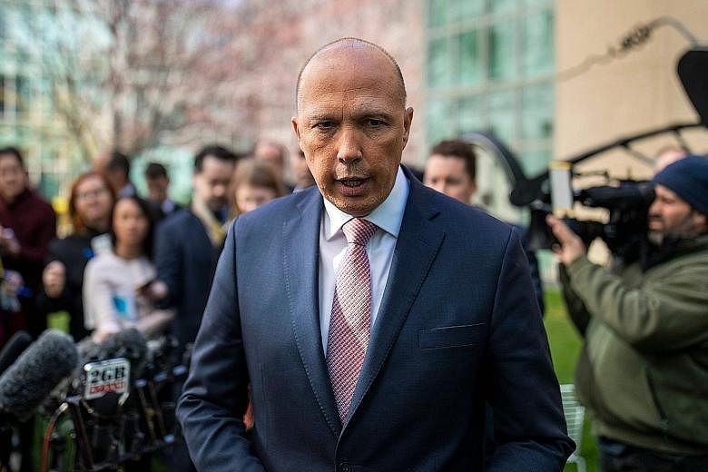 Mr Peter Dutton has become the unsmiling face of enforcement, defending Australia's harsh offshore detention camps, delaying citizenship applications, and arguing for cuts in overall immigration.