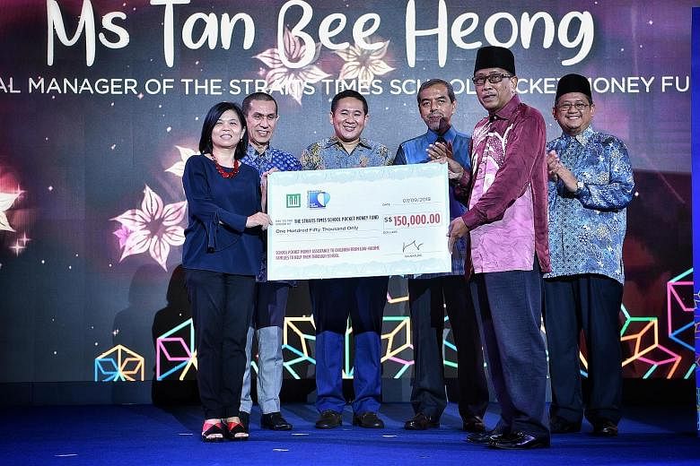 From left: Ms Tan Bee Heong, general manager of The Straits Times School Pocket Money Fund; Muis president Mohammad Alami Musa; Senior Parliamentary Secretary for Home Affairs and Health Amrin Amin; Muis chief executive Abdul Razak Hassan Maricar; Mr