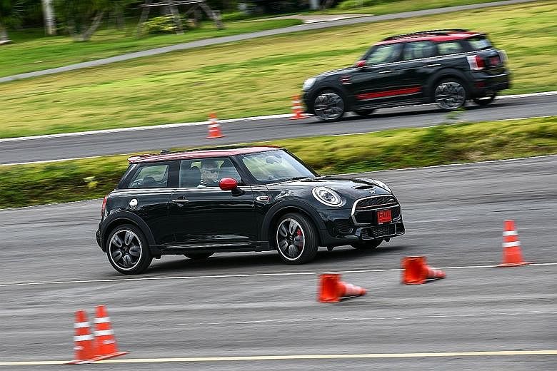 (From far left) Mini John Cooper Works Countryman, JCW Clubman, JCW Convertible and JCW 3-Door. Of these, the 3-Door (above, foreground) is the quickest, with a century sprint time of 6.1 seconds.