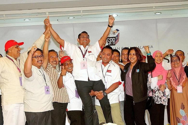 Pakatan Harapan's Seri Setia candidate, Mr Halimey Abu Bakar, after his by-election victory. He won with 13,725 votes against the 9,698 votes of PAS candidate Dr Halimah Ali. PH's Balakong candidate, Ms Wong Siew Ki, garnered 22,508 votes against 3,9