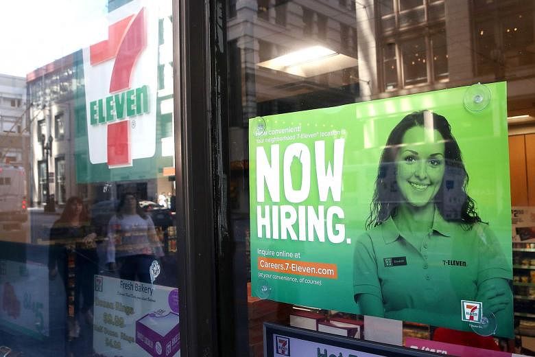 A hiring sign outside a 7-Eleven store in San Francisco. There are many low-wage earners in the United States who would love to have a real career and be able to support a family. But life gets in the way: training can cost tens of thousands of dolla