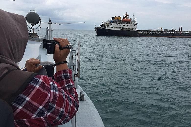 MV Eastern Glory in waters off Batam. The vessel was intercepted last Wednesday. The Indonesian captain and his crew are being detained for investigation and are facing charges as stipulated under Indonesian laws that cover trade of oil and gas, and 